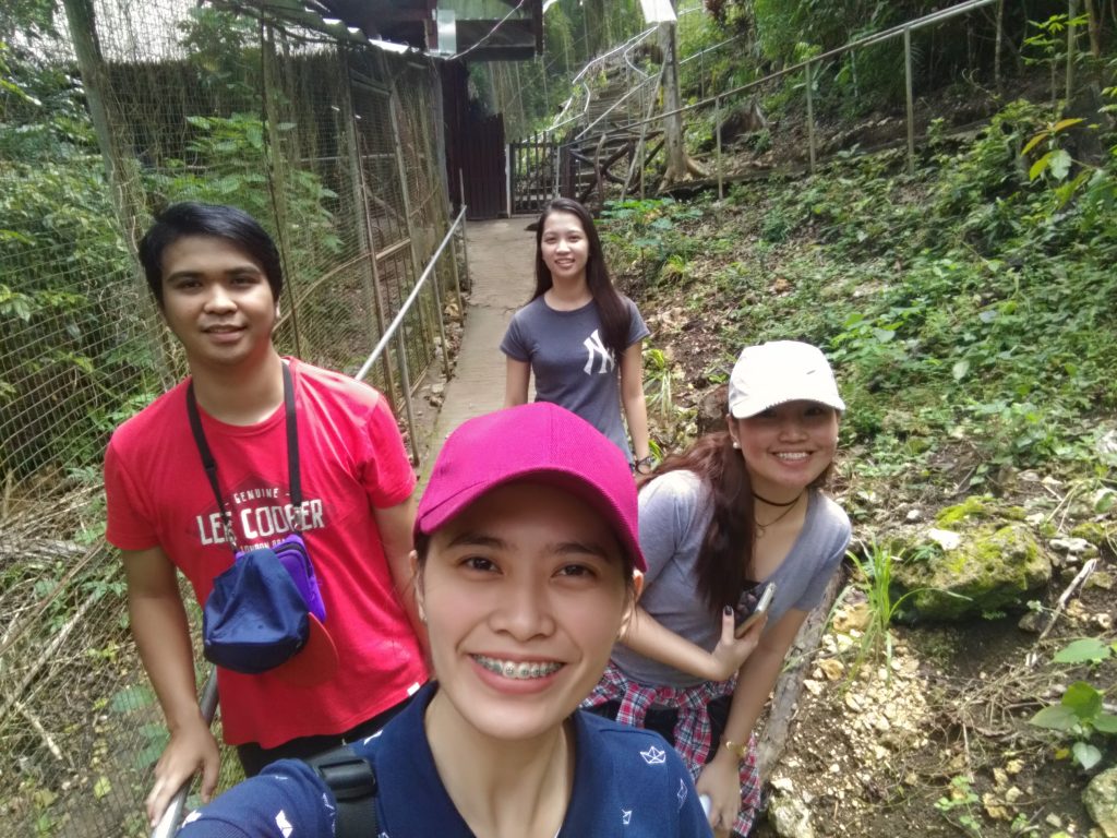 a group picture with my friends while walking around the tarsier conservatory