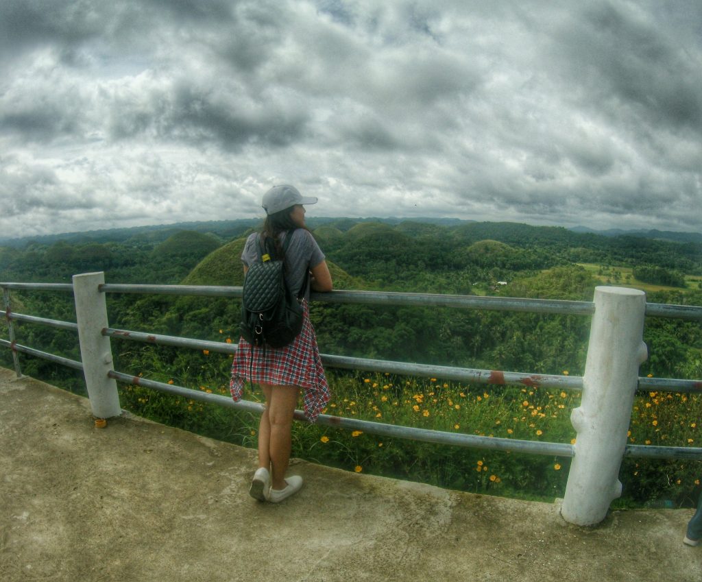a picture of me while looking at the chocolate hills from the viewing deck