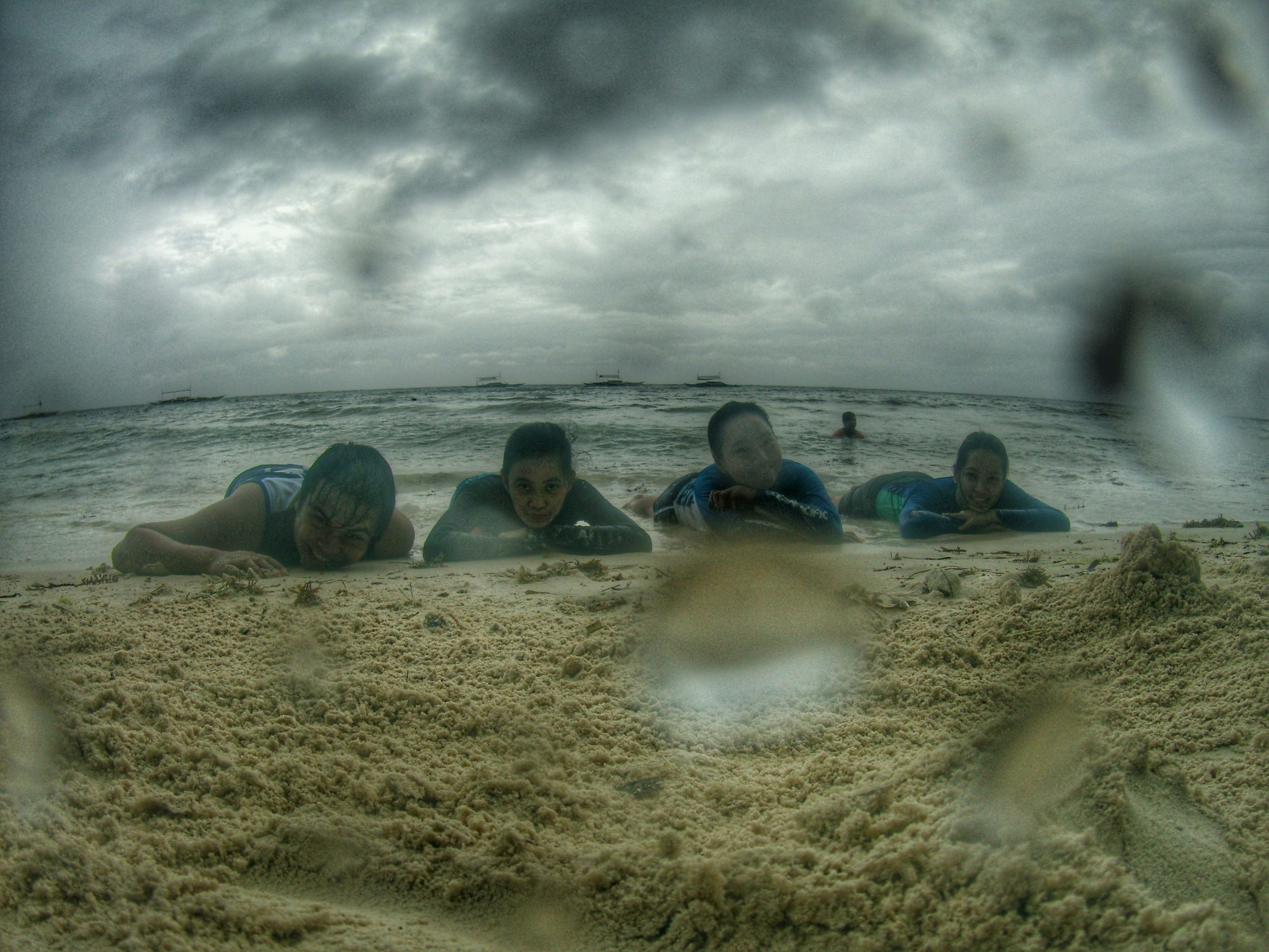 enjoying the beach with friends at a panglao bohol beach resort