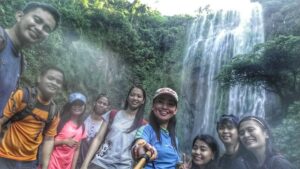 group picture with friends in front of hulugan falls in laguna